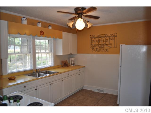 3320 Beaty Road Gastonia, NC 28056 - Photo 5 of 16 a kitchen with a sink and a window