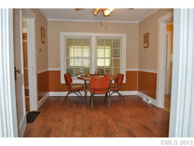 3320 Beaty Road Gastonia, NC 28056 - Photo 7 of 16 a view of a dining room with furniture and chandelier
