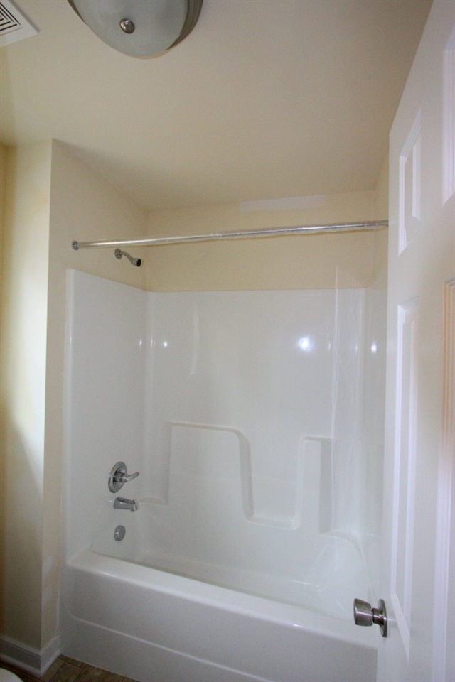 13 Winding Ridge Way Bumpass, VA 23024 - Photo 7 of 17 a bathroom with a shower and a bath tub