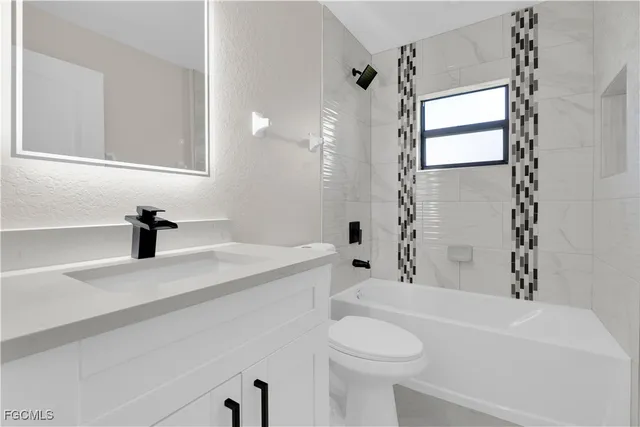 $379,900 | 3422 20th Street West, Lehigh Acres, FL 33971