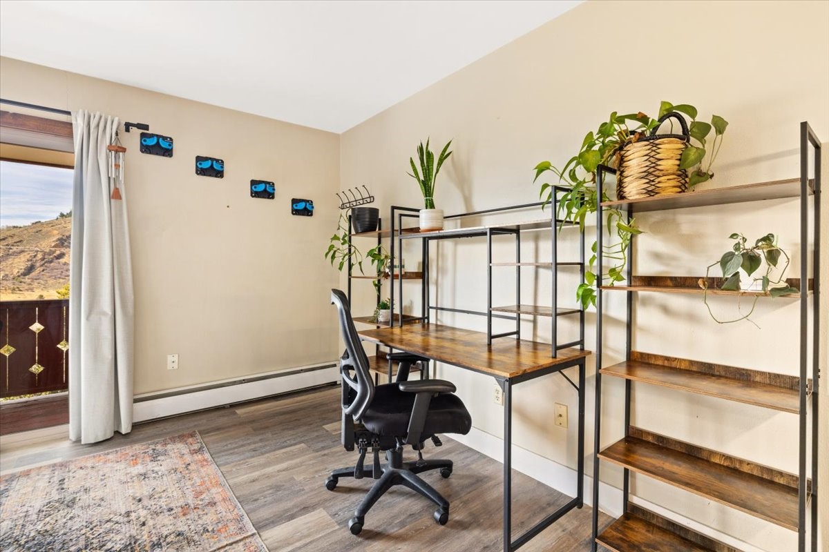 110 Evergreen Road, Unit 301 Dillon, CO 80435 - Photo 7 of 23 a view of a workspace with furniture and wooden floor