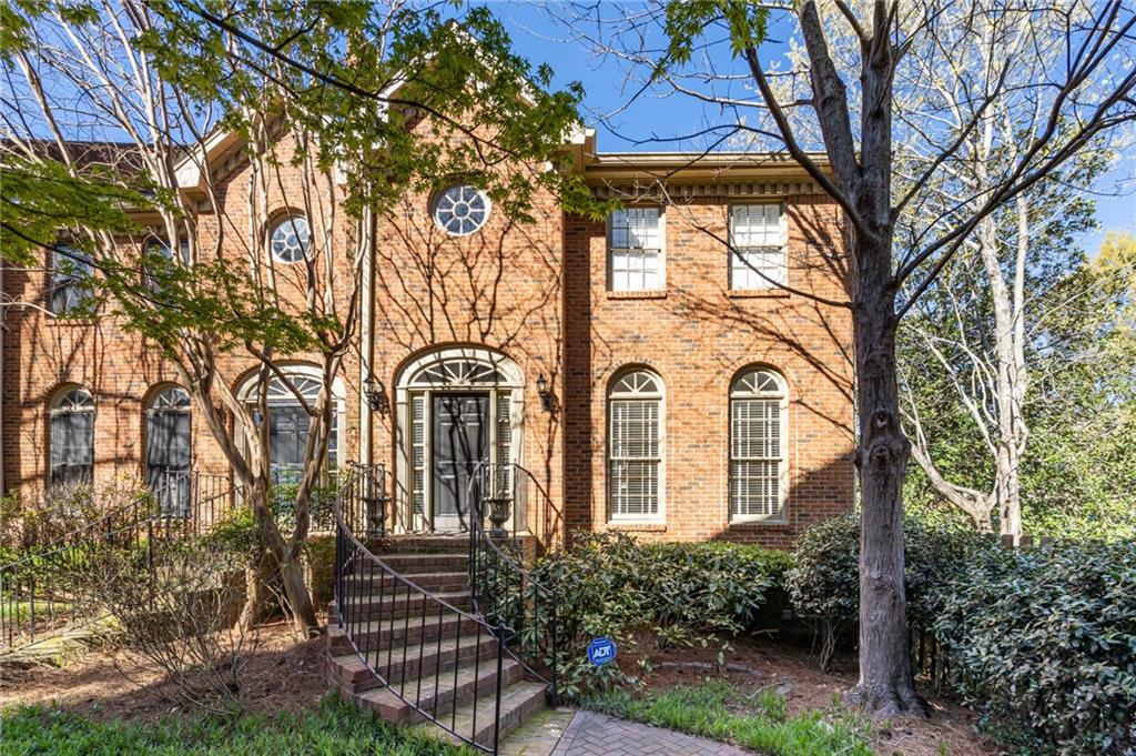 142 North Candler Street Decatur, GA 30030 - Photo 1 of 1 a front view of a house with a garden
