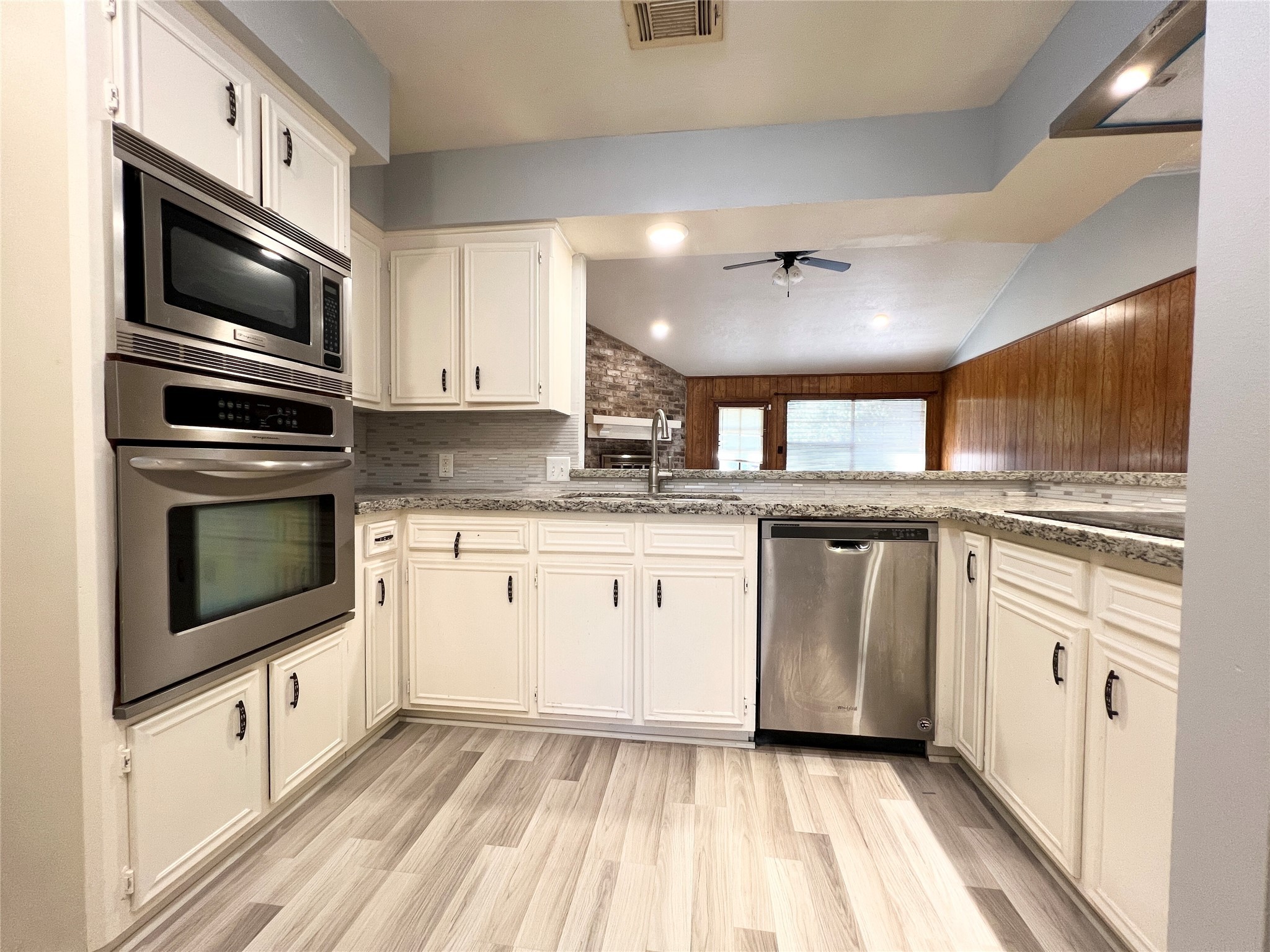 422 Gamewood Drive Spring, TX 77386 - Photo 6 of 26 a kitchen with granite countertop cabinets stainless steel appliances and a sink