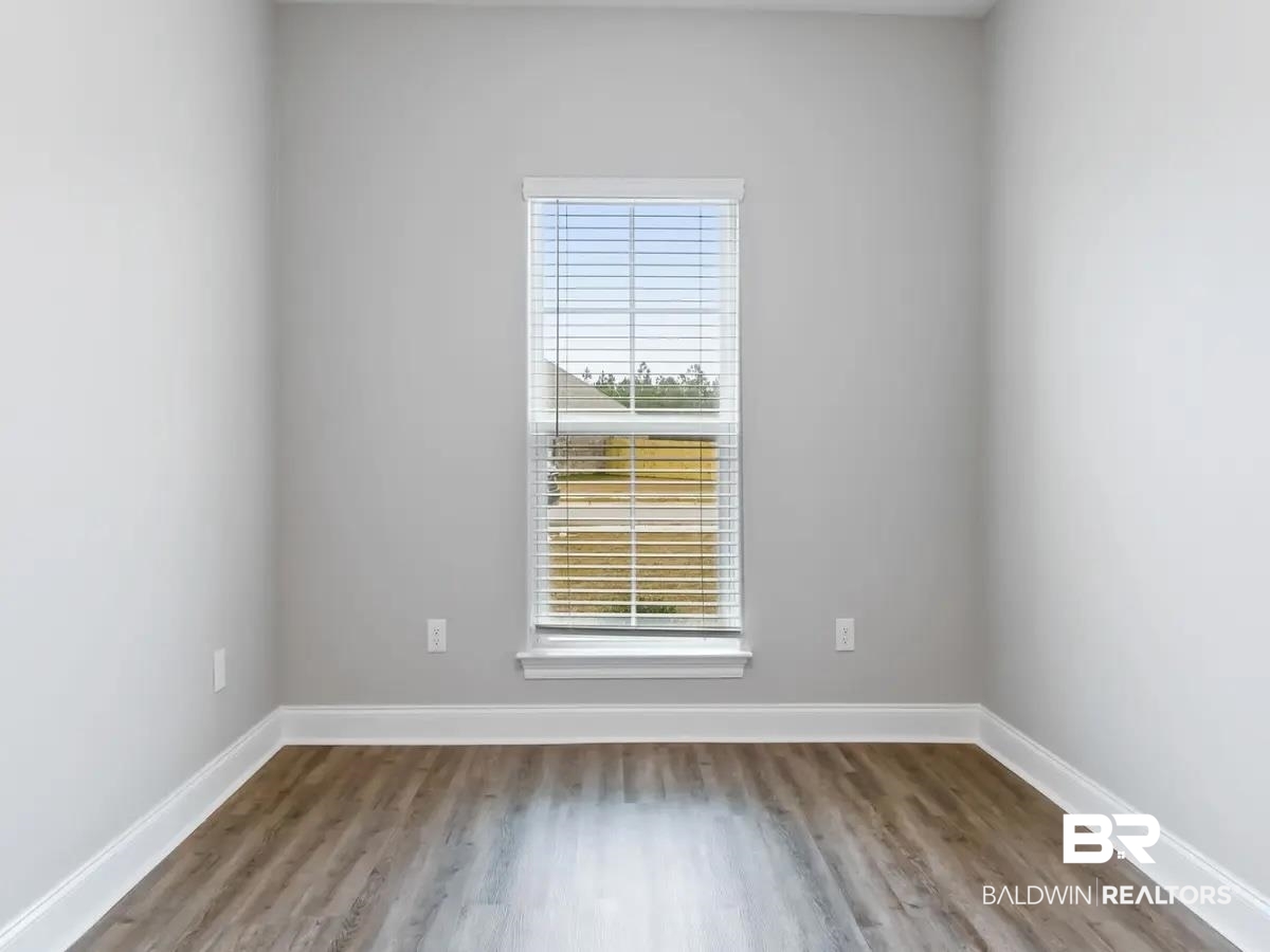 10174 Grady Lane Mobile, AL 36695 - Photo 14 of 14 Empty room with light wood-type flooring