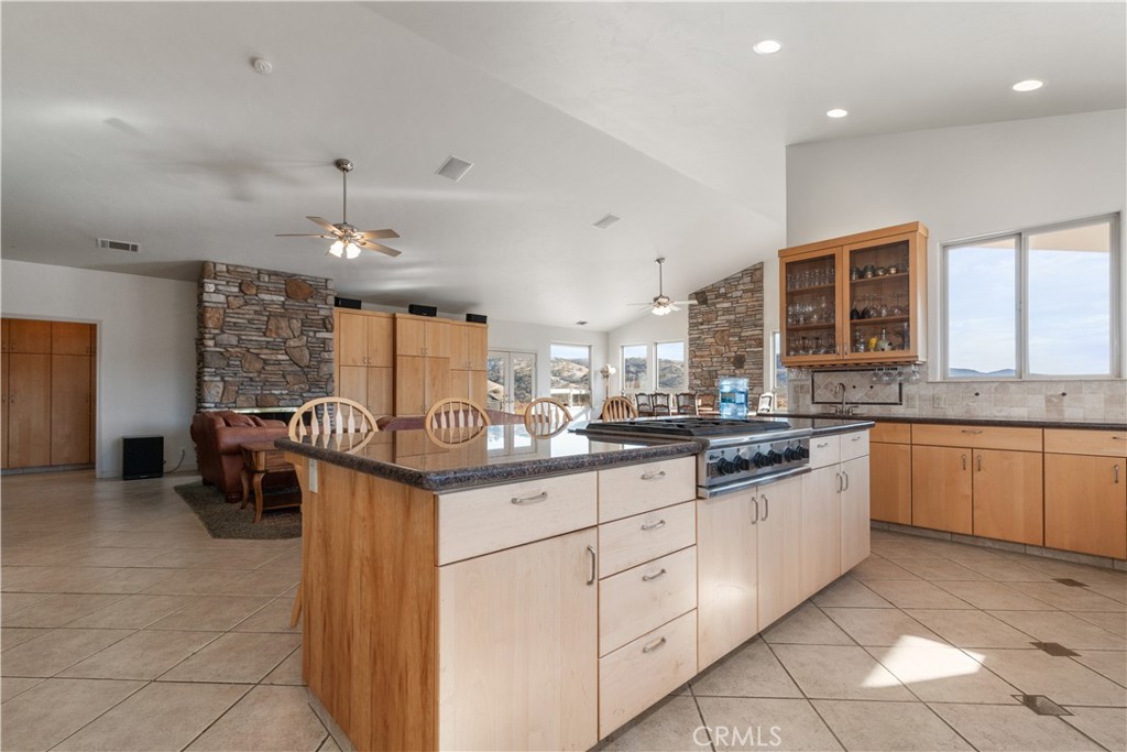 75751 Indian Valley Road San Miguel, CA 93451 - Photo 42 of 60 a kitchen with granite countertop a sink and cabinets