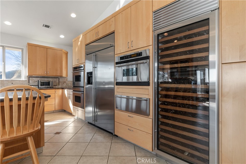 75751 Indian Valley Road San Miguel, CA 93451 - Photo 45 of 60 a kitchen with granite countertop a refrigerator and stove