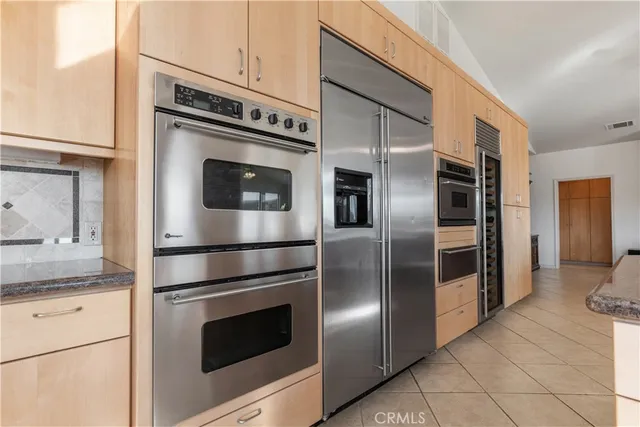 a utility room with sink dryer and washer