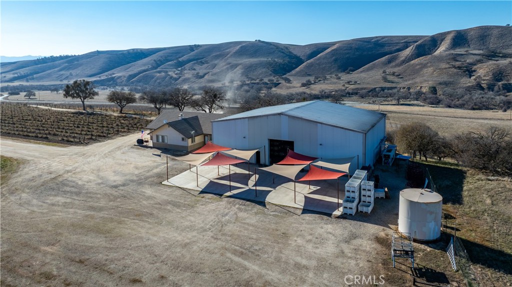 75751 Indian Valley Road San Miguel, CA 93451 - Photo 5 of 60 a backyard of a house with table and chairs
