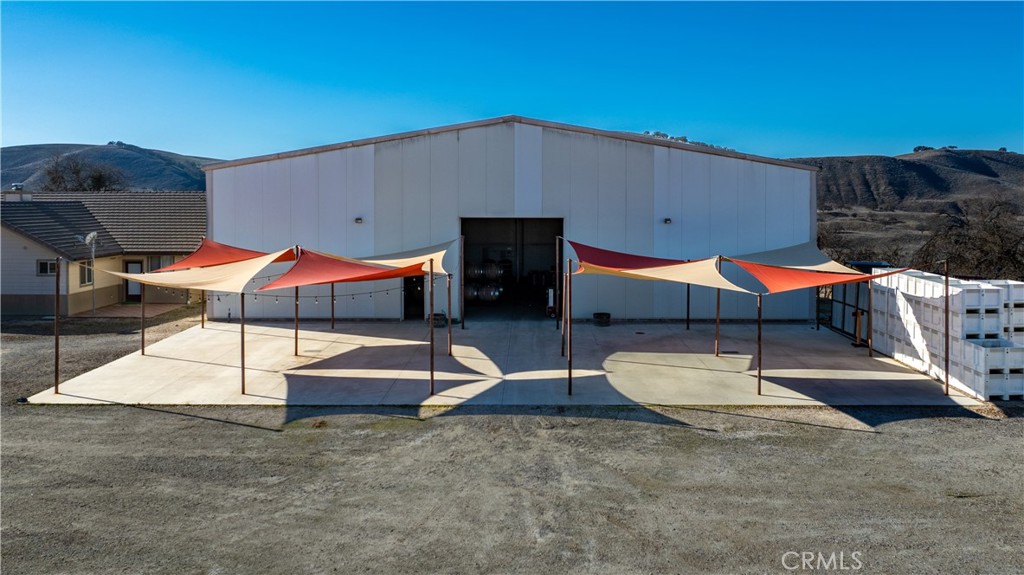 75751 Indian Valley Road San Miguel, CA 93451 - Photo 7 of 60 an outdoor space with patio and white umbrellas