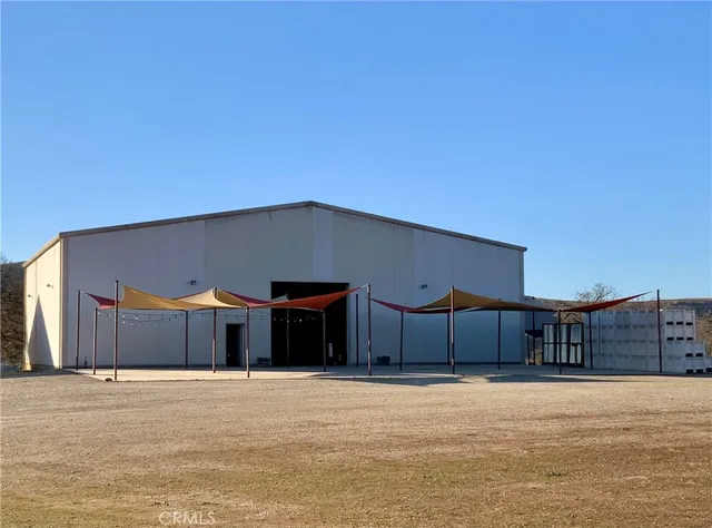 a view of a room with washer and dryer
