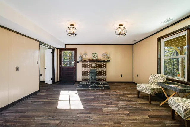 a view of empty room with trees