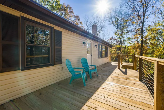 a view of a house with a tree