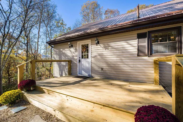 a view of a backyard of the house