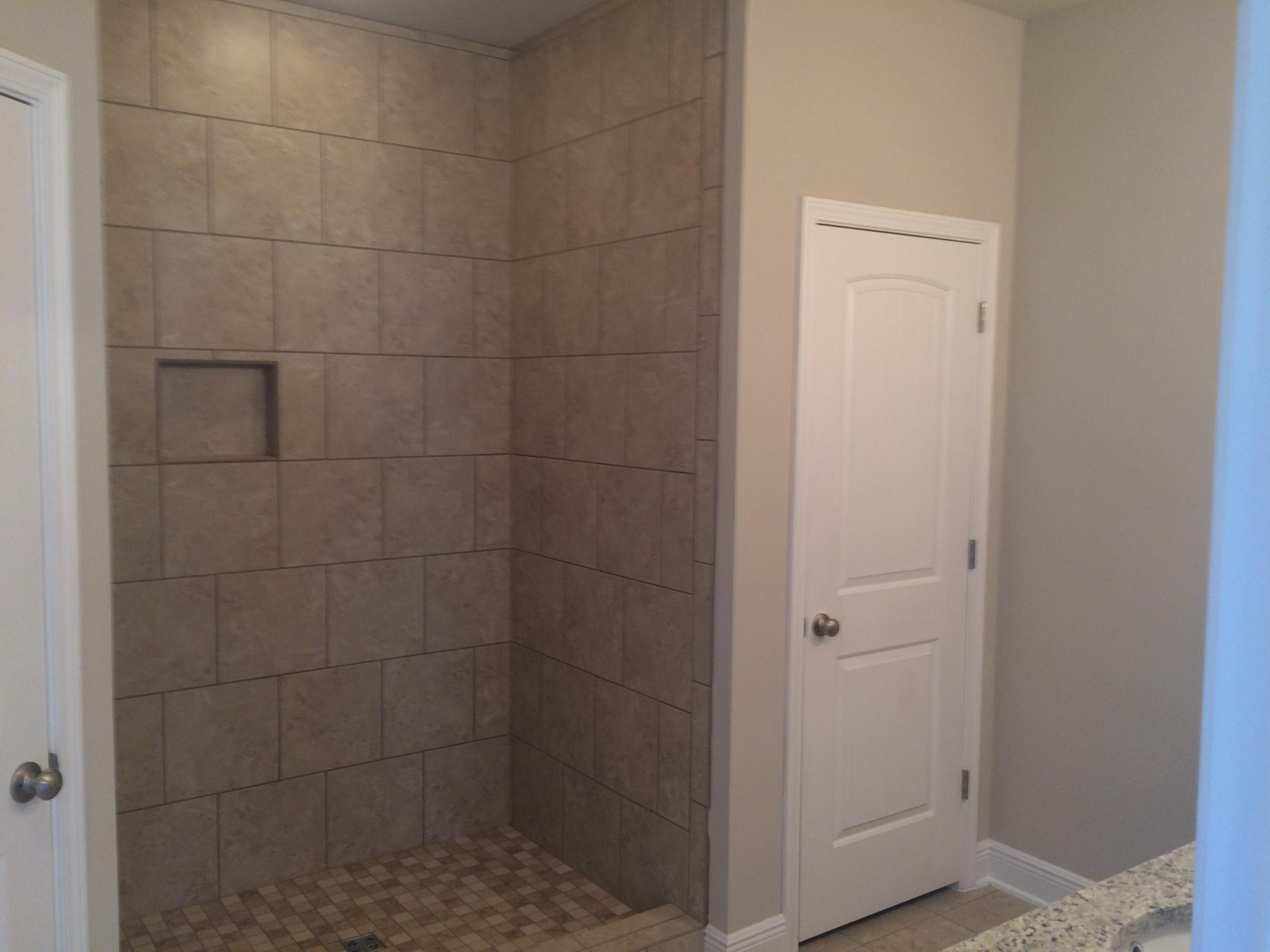 439 Pin Oak Loop Santa Rosa Beach, FL 32459 - Photo 14 of 17 a bathroom with a shower