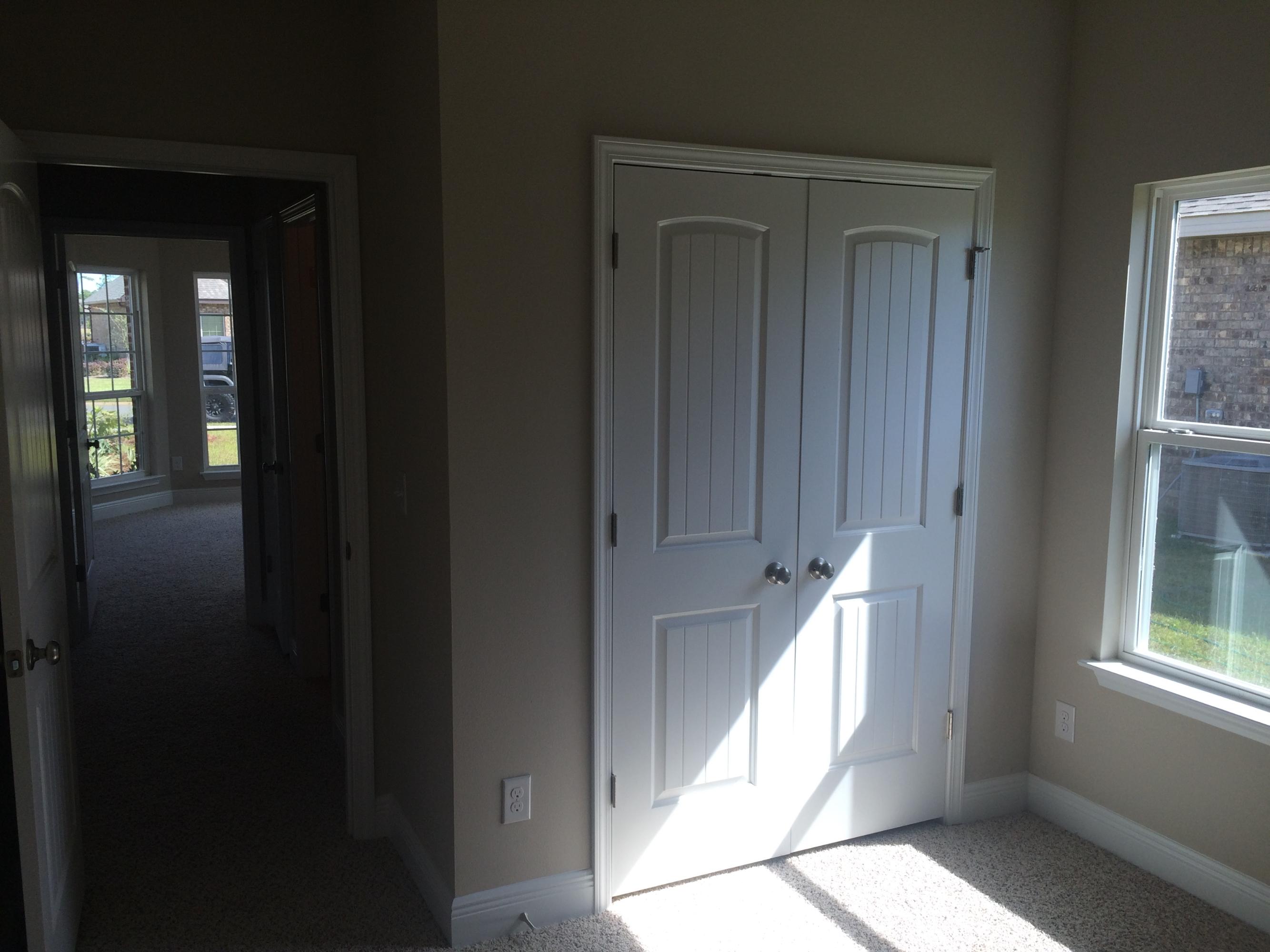 439 Pin Oak Loop Santa Rosa Beach, FL 32459 - Photo 8 of 17 a view of an entryway with wooden floor