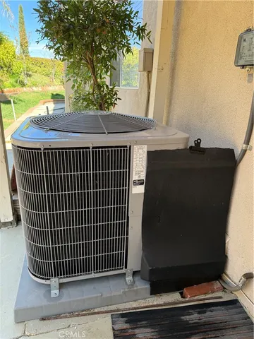 a view of a door and wooden fence
