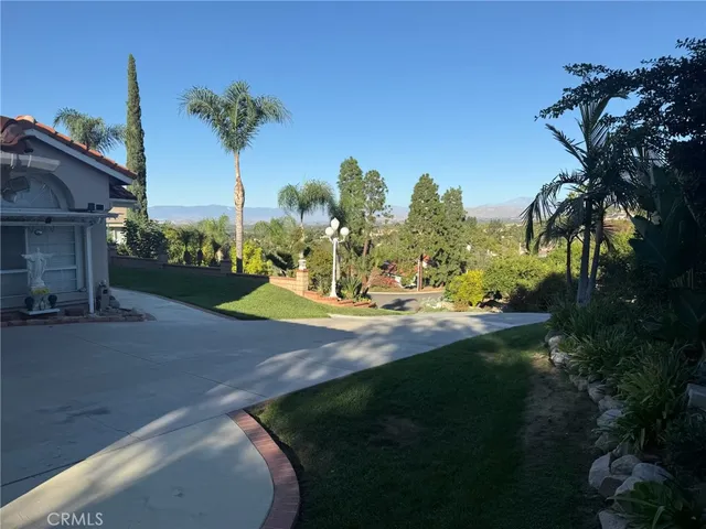 a view of a playground with basketball court