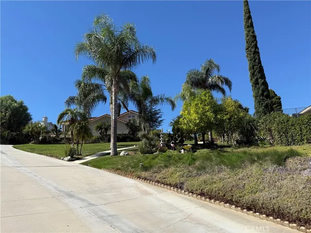 a view of a park with a houses