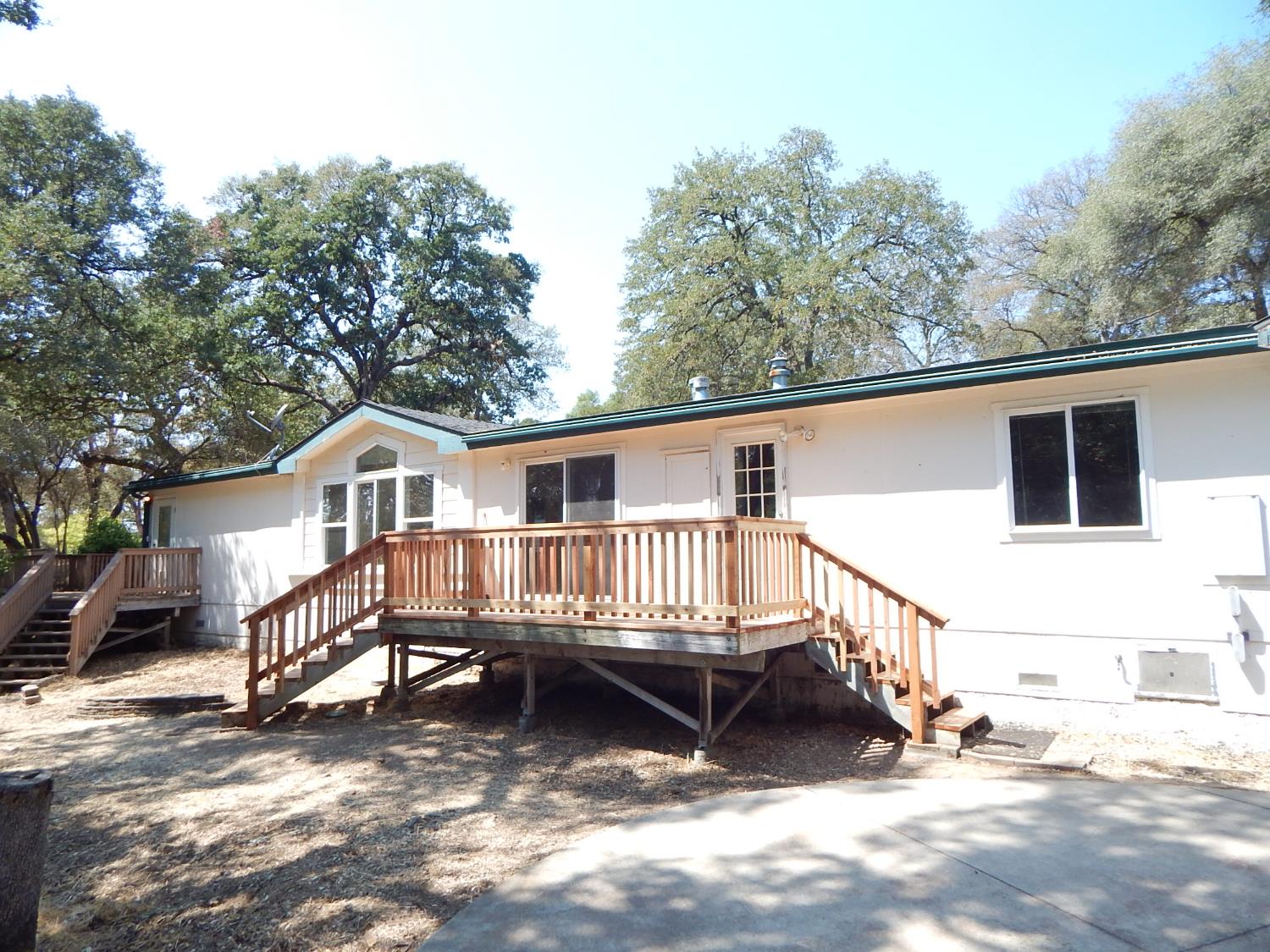 3017 Mandolin Way Placerville, CA 95667 - Photo 1 of 1 a view of a house with a wooden deck