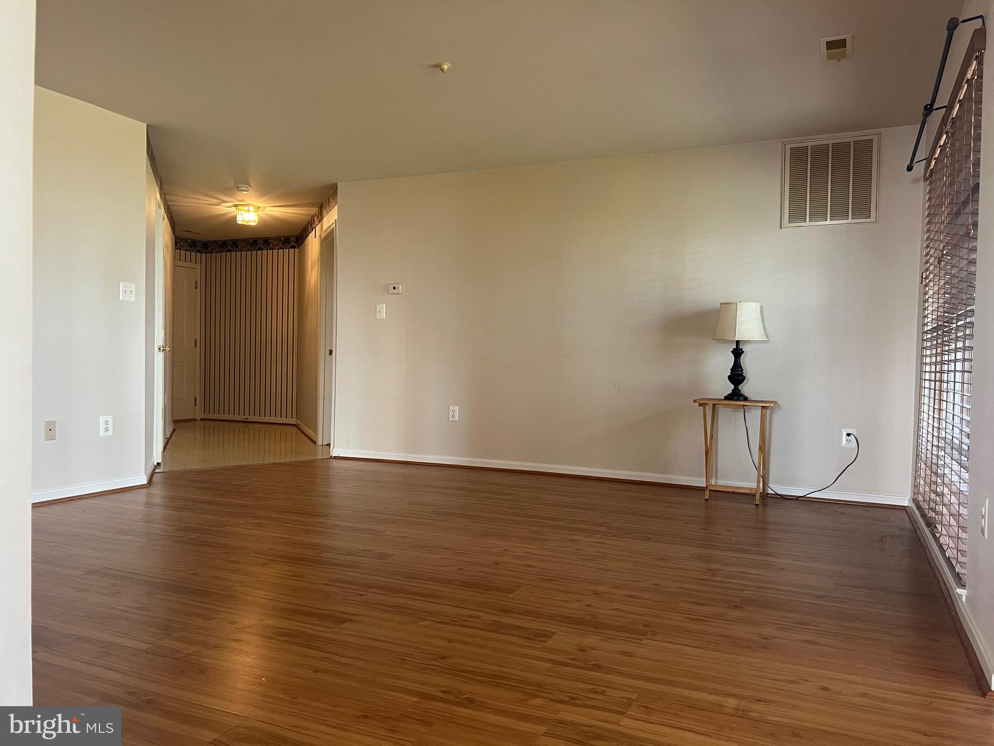 2510 Coach House Way, Unit 1C Frederick, MD 21702 - Photo 10 of 38 Laminate Floor Throughout Living areas