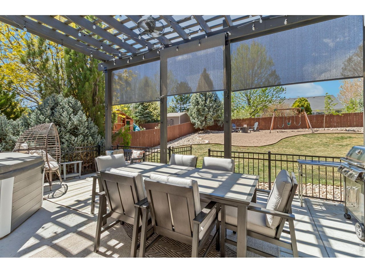 6227 Westchase Road Fort Collins, CO 80528 - Photo 31 of 38 large composite deck w pergola