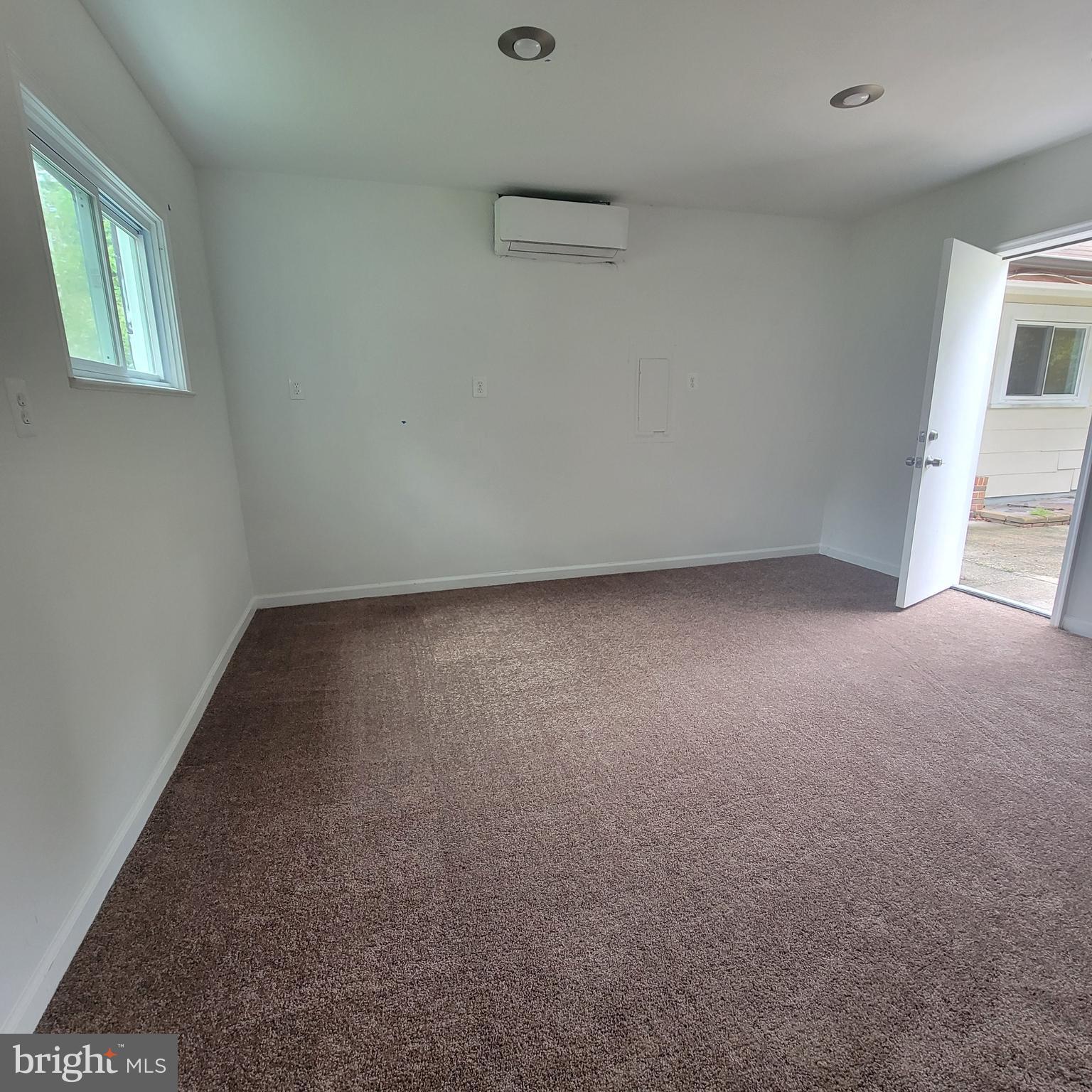 13300 Williams Drive Brandywine, MD 20613 - Photo 14 of 17 an empty room with a empty space and windows