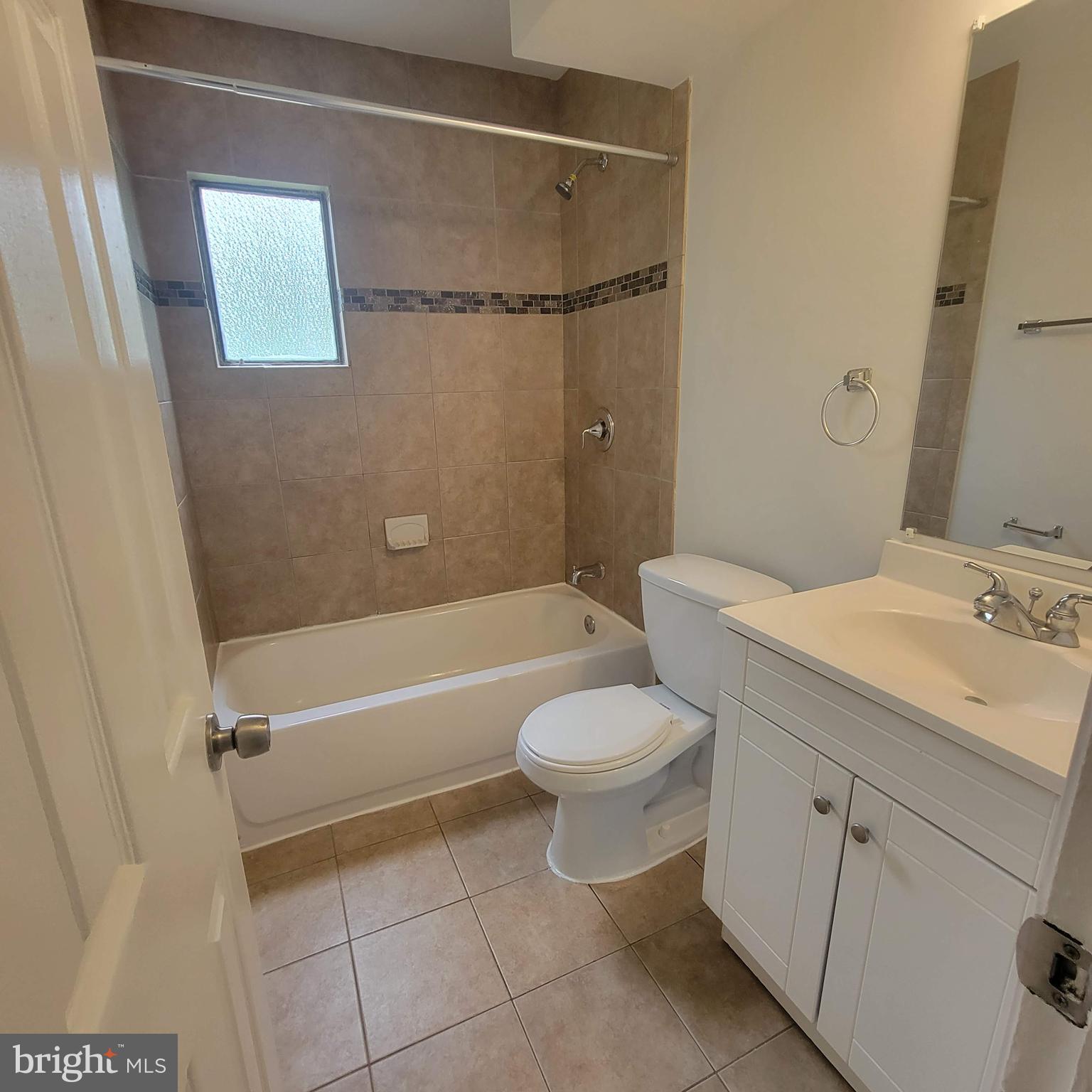 13300 Williams Drive Brandywine, MD 20613 - Photo 8 of 17 a bathroom with a sink a toilet and shower