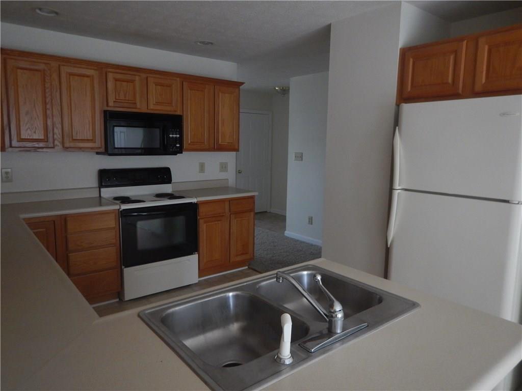 7755 Rahke Road Indianapolis, IN 46217 - Photo 4 of 7 Gallery Image 4