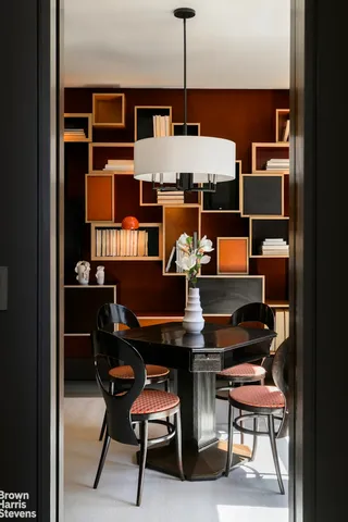 a reading room with furniture window and lamp