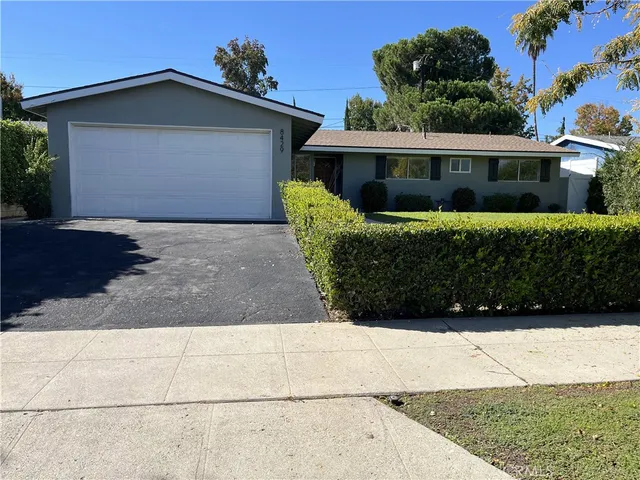 a front view of house with yard