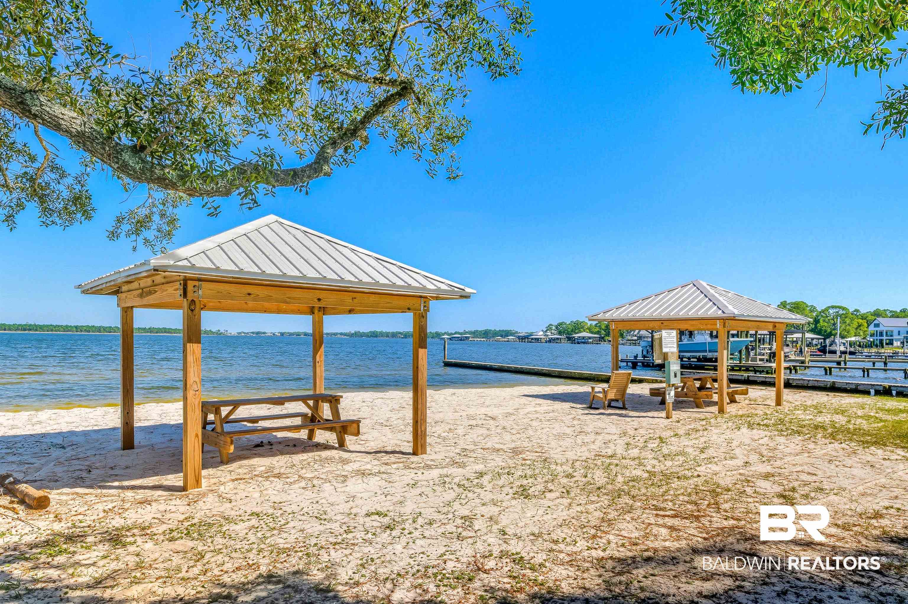 5310 Pine Road Orange Beach, AL 36561 - Photo 27 of 46 Dock with a gazebo, a water view, and a patio area
