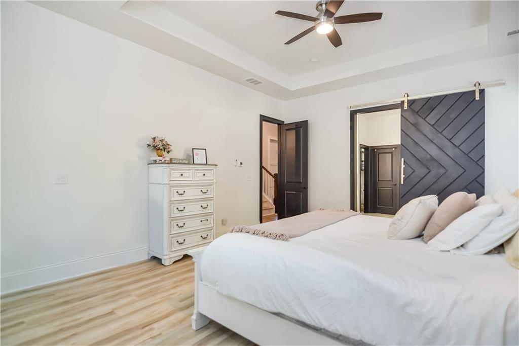 601 Legacy Run Ball Ground, GA 30107 - Photo 20 of 58 a bedroom with a bed and a closet