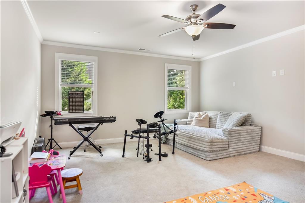 601 Legacy Run Ball Ground, GA 30107 - Photo 35 of 58 a living room with furniture and a window