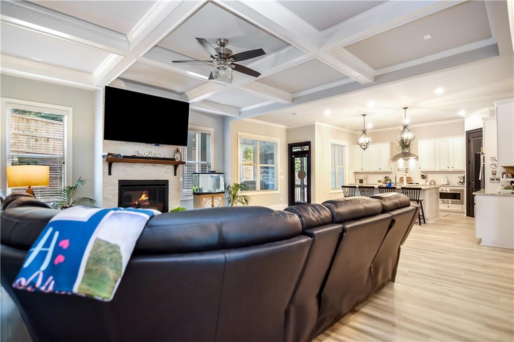 601 Legacy Run Ball Ground, GA 30107 - Photo 9 of 58 a living room with furniture fireplace and a flat screen tv