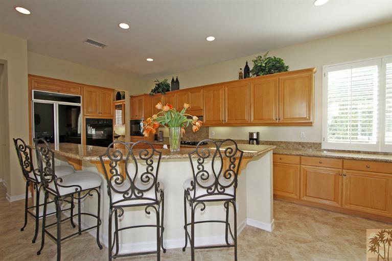 352 Loch Lomond Road Rancho Mirage, CA 92270 - Photo 12 of 25 a view of a dining room with furniture window and outside view
