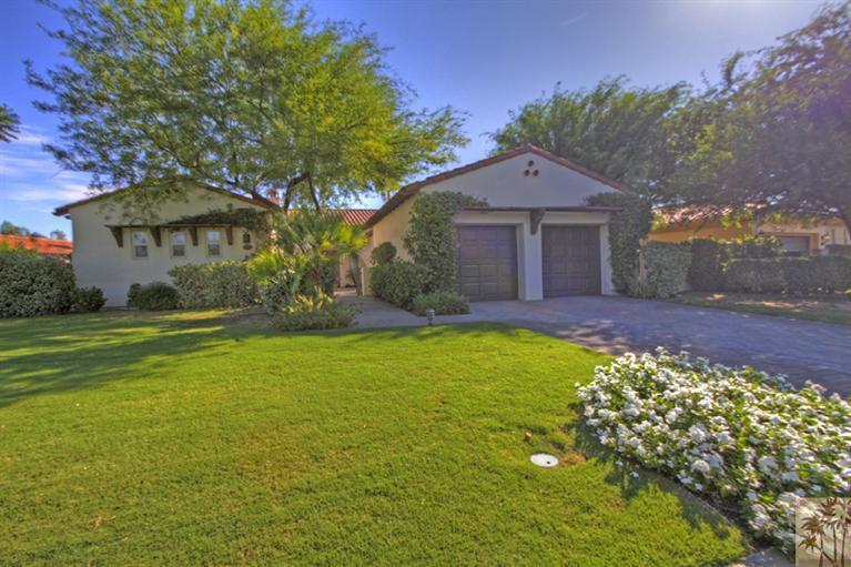 352 Loch Lomond Road Rancho Mirage, CA 92270 - Photo 3 of 25 a front view of a house with a yard