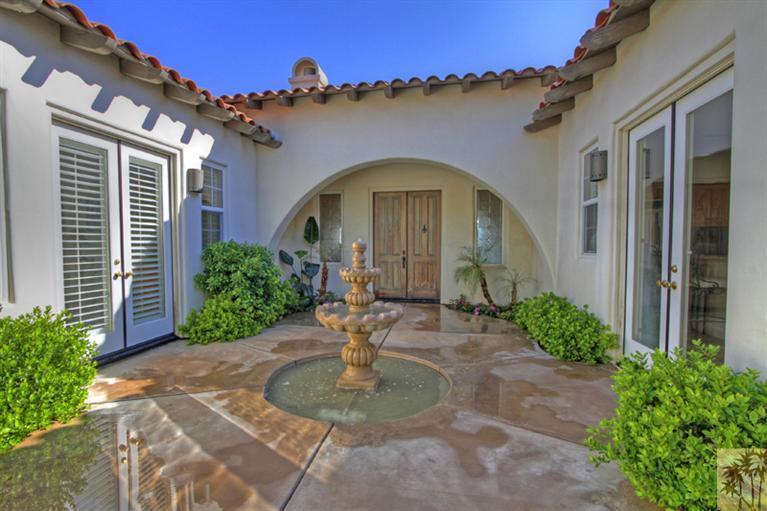 352 Loch Lomond Road Rancho Mirage, CA 92270 - Photo 4 of 25 a front view of a house with garden