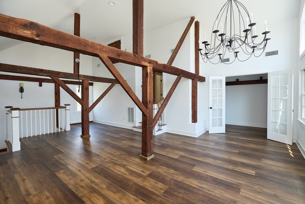 685 Highland Street Marshfield, MA 02050 - Photo 11 of 38 a view of entryway and hall with wooden floor