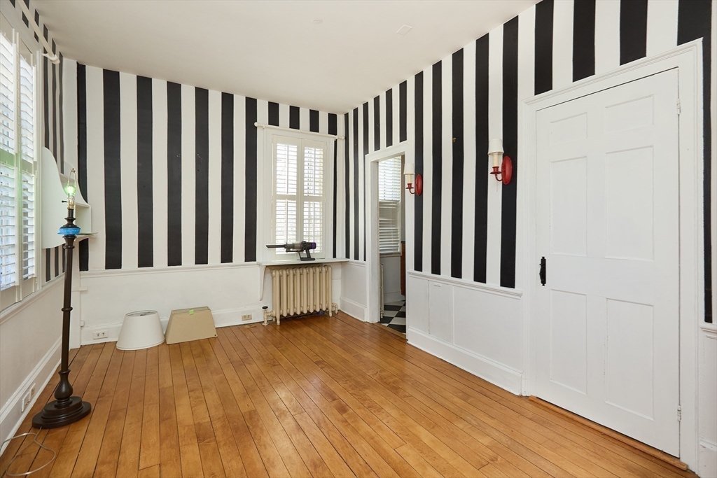 685 Highland Street Marshfield, MA 02050 - Photo 14 of 38 a view of a balcony with wooden floor