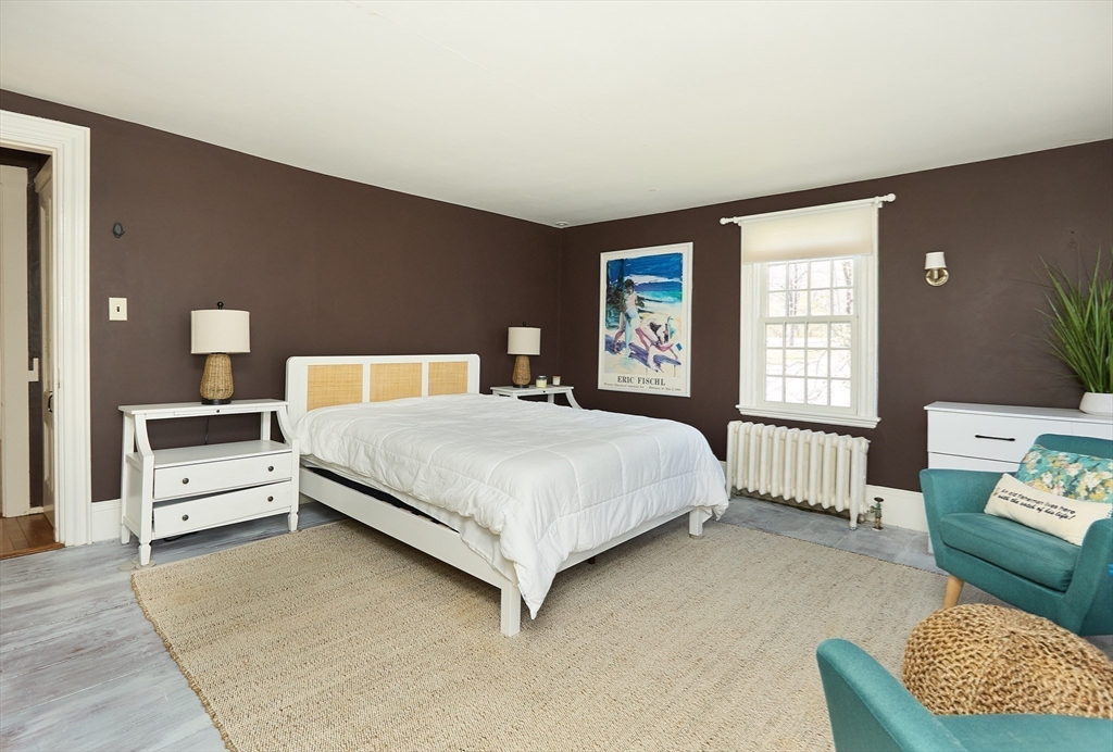 685 Highland Street Marshfield, MA 02050 - Photo 22 of 38 a bedroom with a bed a couch and dresser