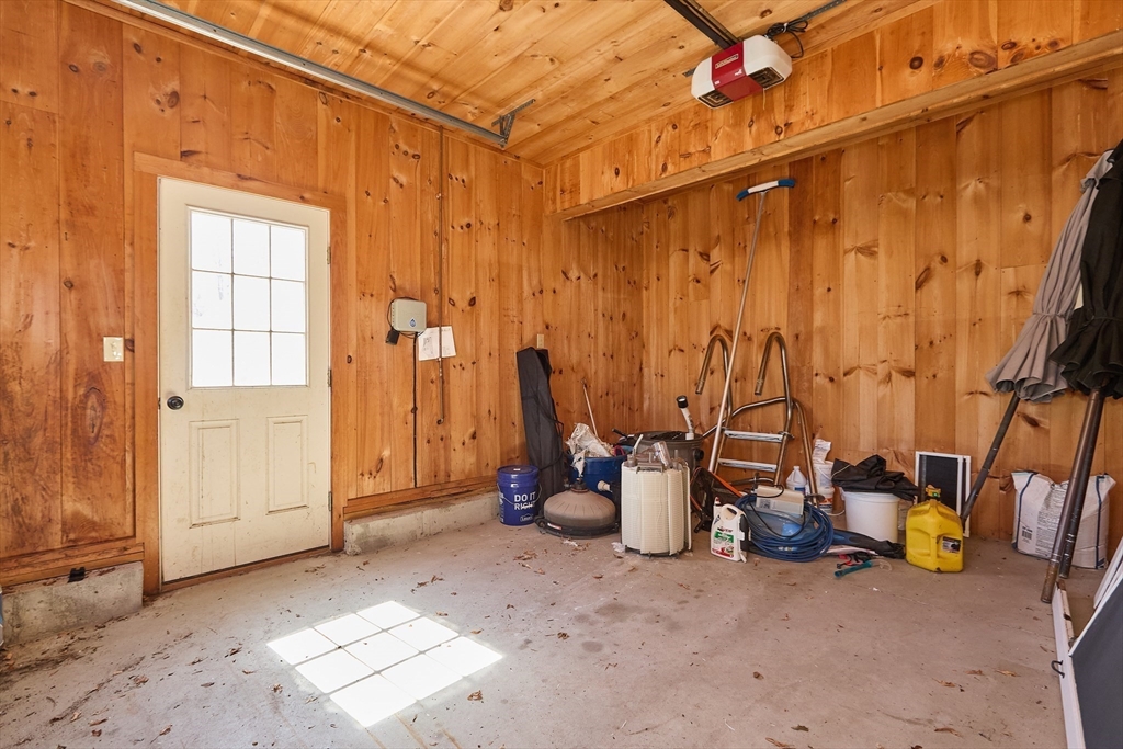 685 Highland Street Marshfield, MA 02050 - Photo 35 of 38 a view of a patio with a table and chairs
