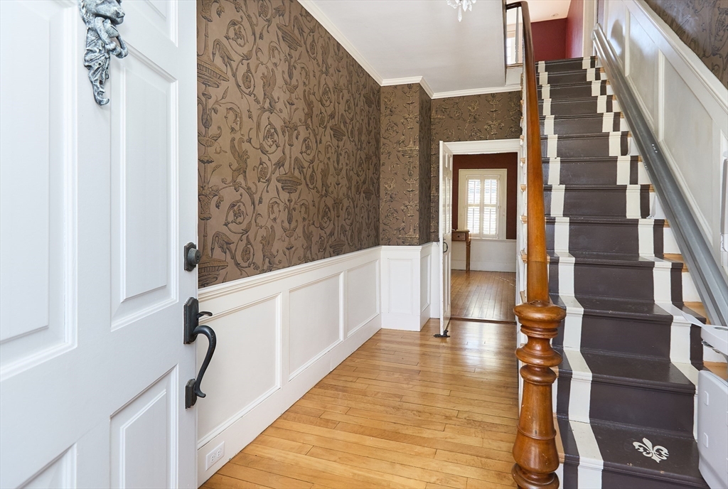 685 Highland Street Marshfield, MA 02050 - Photo 8 of 38 a view of an entryway with wooden floor