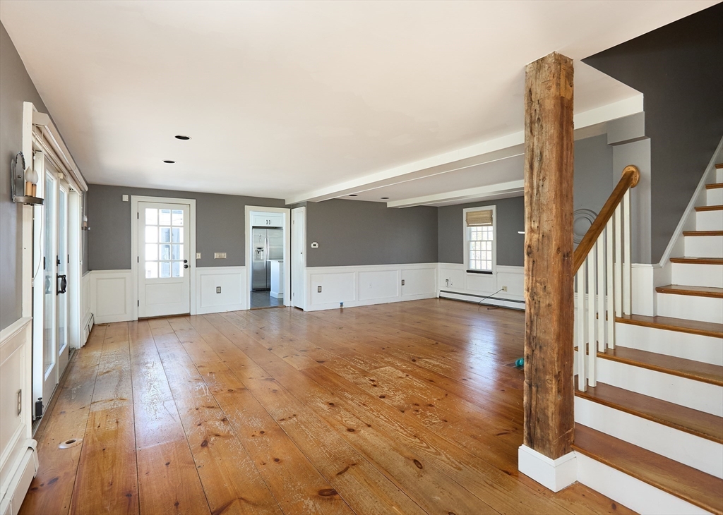 685 Highland Street Marshfield, MA 02050 - Photo 10 of 38 a view of empty room with wooden floor