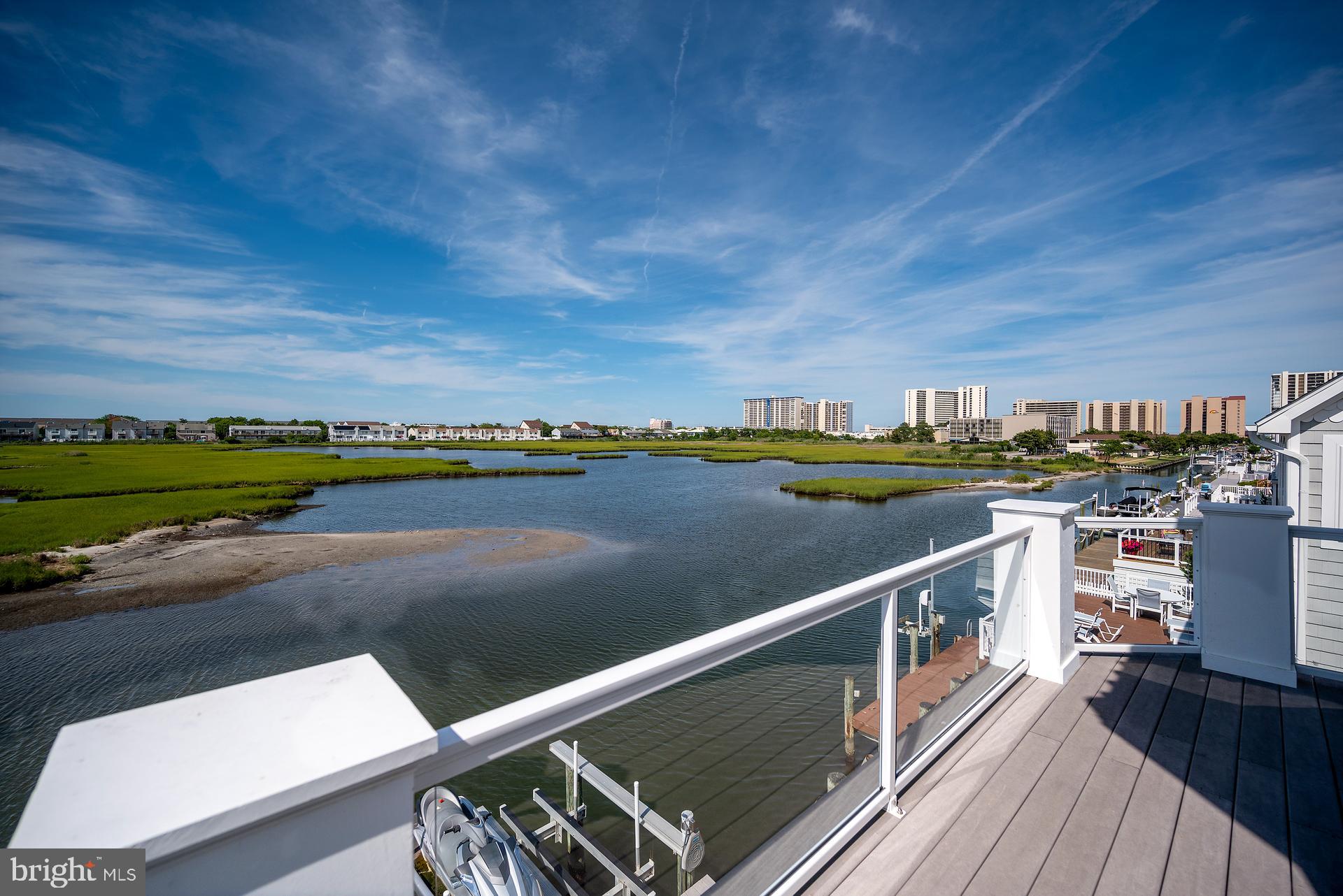 160 Channel Buoy Road Ocean City, MD 21842 - Photo 53 of 71 a view of a balcony with city view