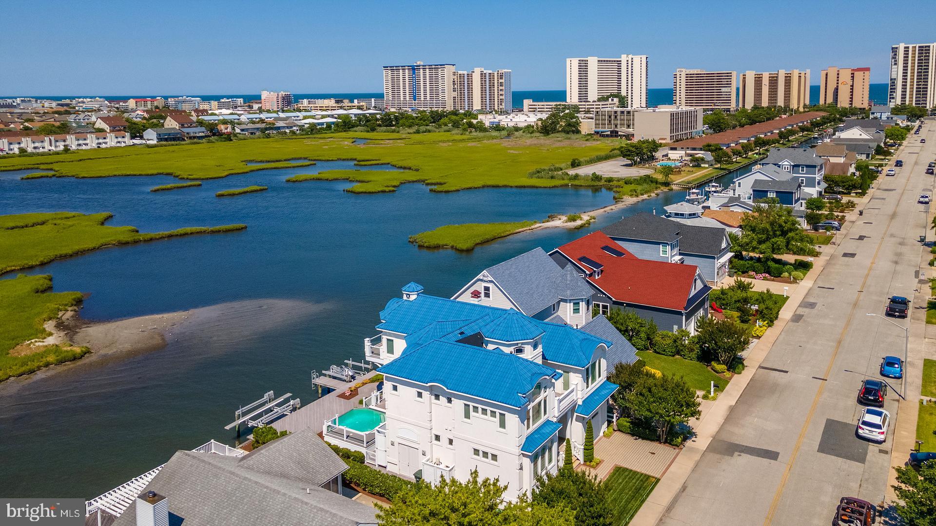 160 Channel Buoy Road Ocean City, MD 21842 - Photo 62 of 71 an aerial view of a house with a swimming pool yard and outdoor seating