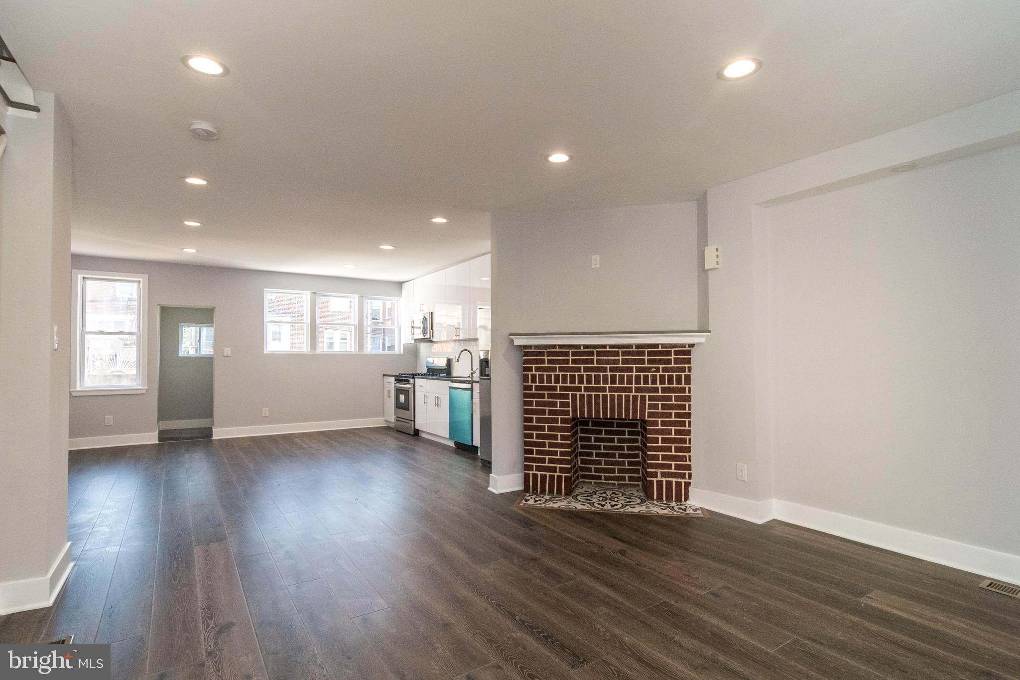 5632 Gainor Road Philadelphia, PA 19131 - Photo 11 of 41 Fireplace in living room