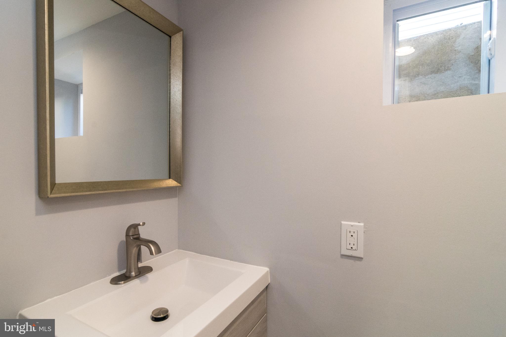 5632 Gainor Road Philadelphia, PA 19131 - Photo 36 of 41 Finished Basement half bathroom