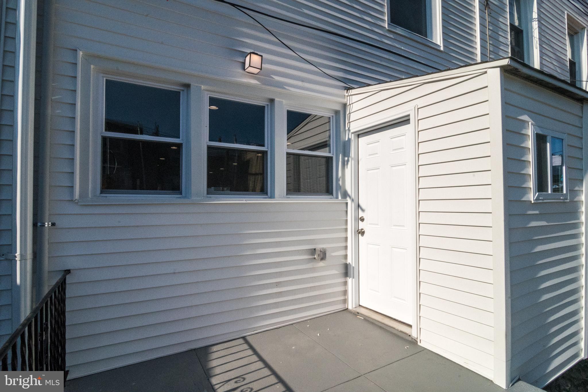 5632 Gainor Road Philadelphia, PA 19131 - Photo 38 of 41 Rear door to deck