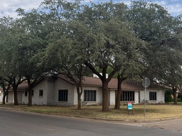 front view of a house with a street