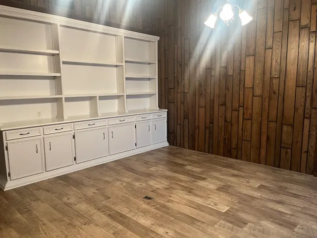 a view of a closet with cabinet